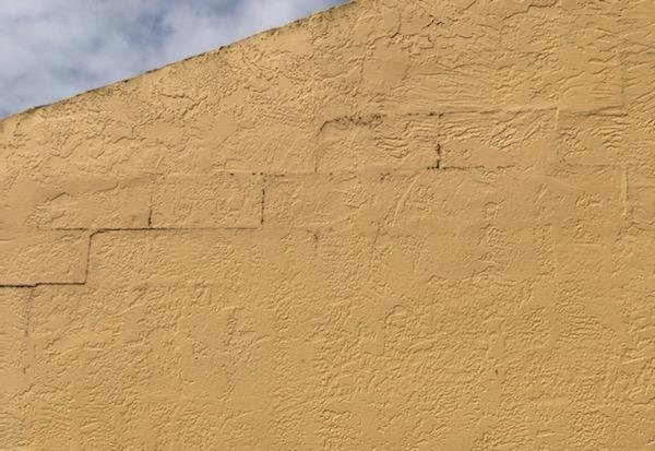 A view of stair steps cracks on this wall in Florida.