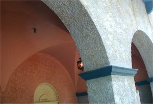 Vaulted ceiling and lace style texture.