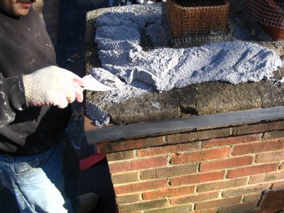 coating deteriorated chimney cap