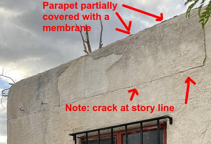 parapet is partially covered with a rubber membrane