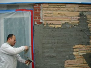 stucco over flagstone.