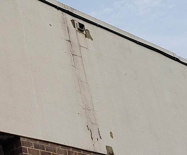 stucco failure is under the joint in the coping.