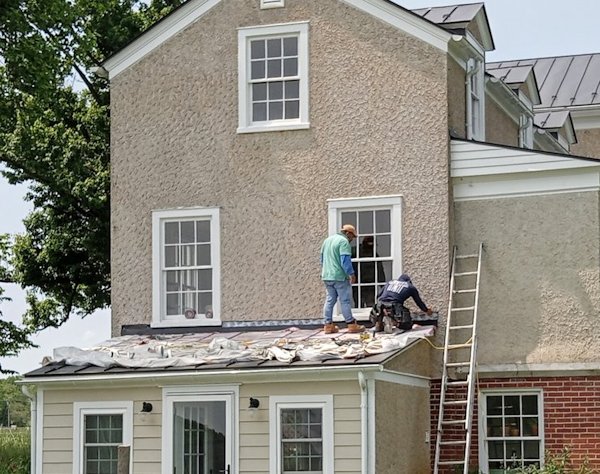 Big stucco wall is porous