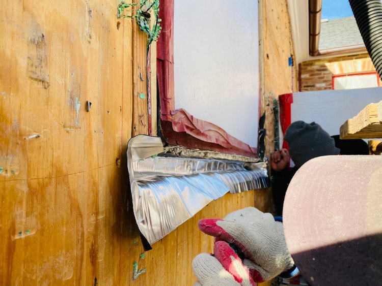 A peel and stick aluminum membrane flashing is put on.