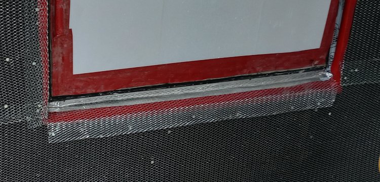 Metal lath is put on the wall.