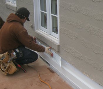 Flashing patched with metal lath and mortar