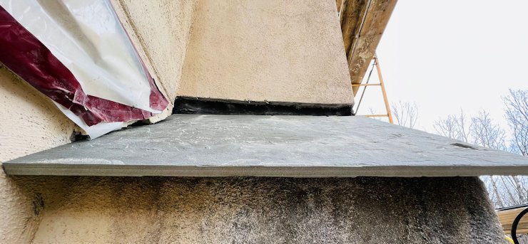 Chimney shoulder showing drip edge