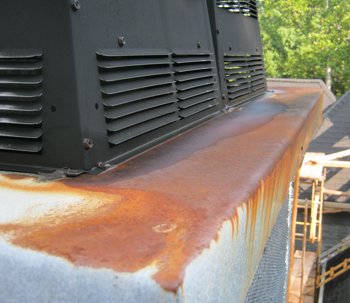 Metal chimney caps rust in McLean, Virginia.