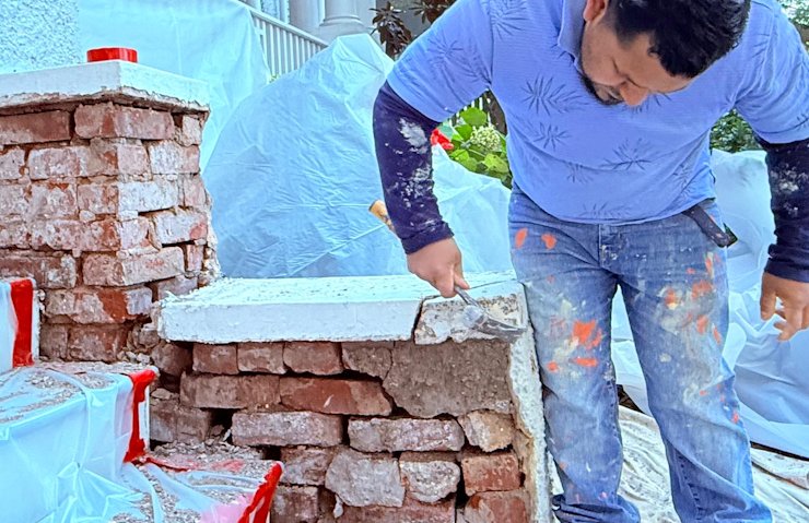 lime and sand mortar holding the bricks together had completely dissolved.