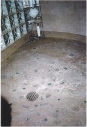 Shower
                floor with inlaid Shower floor with colored glass