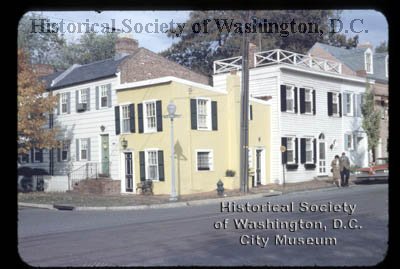 Old yellow pebble dash house in Washington, DC in 1959.