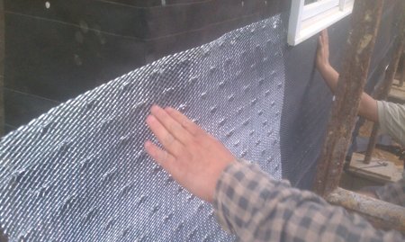 Self furring lath for stucco.