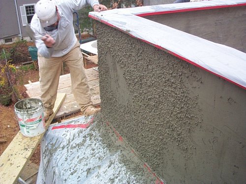 rock mix is constantly stirred with the trowel.