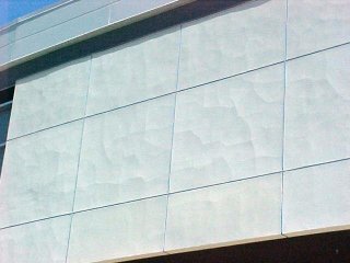 Major cracks on stucco panel