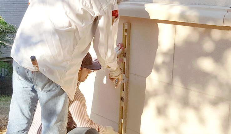 Joints are scored with a speed square on this new stucco house in Bethesda