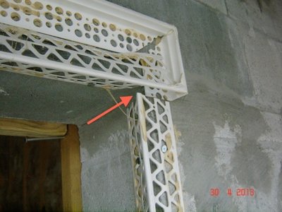 Plastic corner bead on stucco band