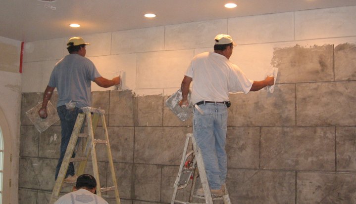 On these faux granite blocks the brown coat was scored first creating a deep joint