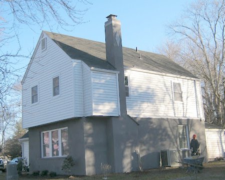 stucco over spalled brick