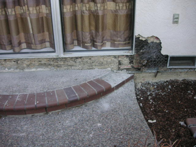 tying in stucco to new doors and patio